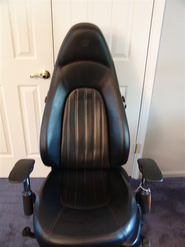 Illustration for article titled Race Car Chairs Give You Office Pole Position